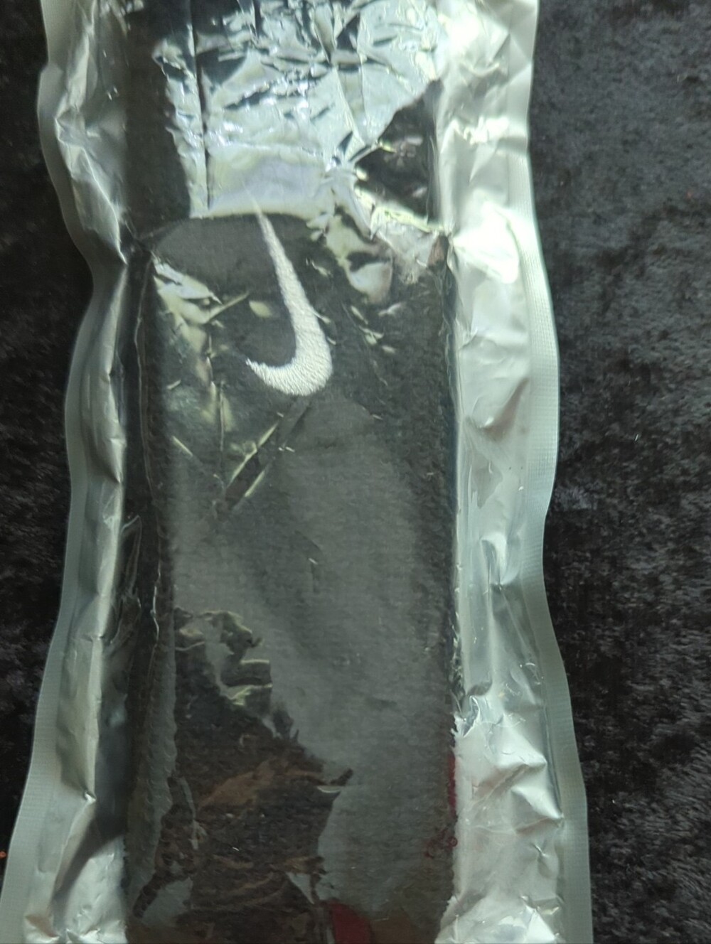 Nike Black Holster Clip with White Swoosh Logo